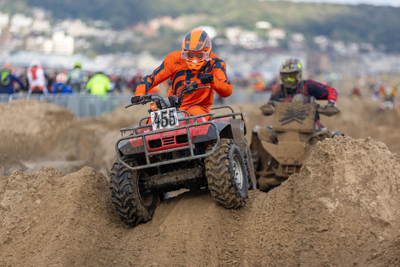 A quad bike races though the sand dunes at the Weston-super-Mare Beach Race