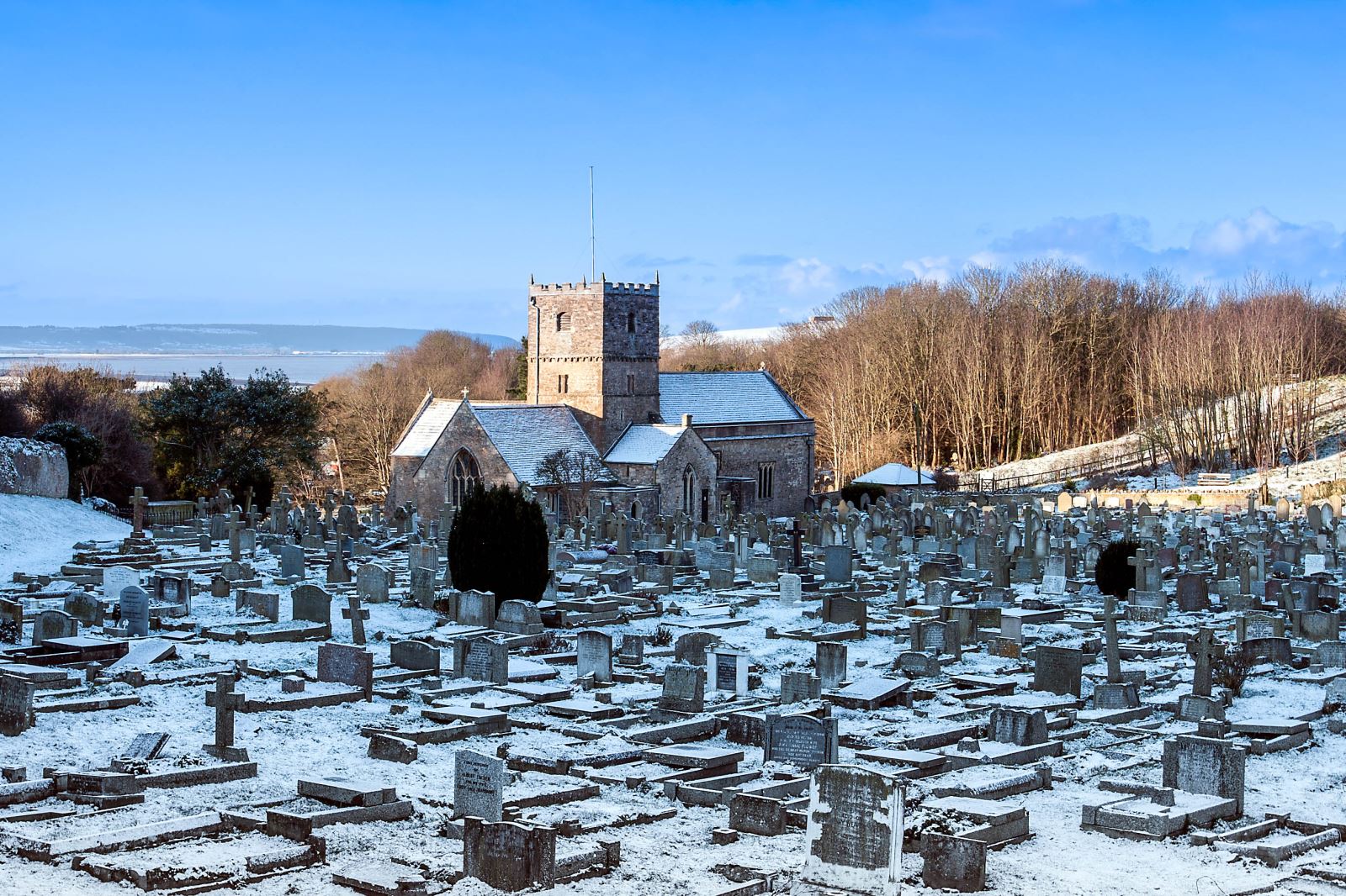 A snowy churchyard