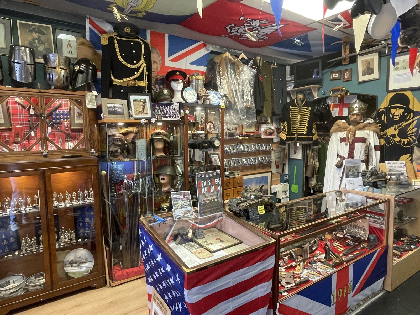 A Market stall showing collectables many of a military variety