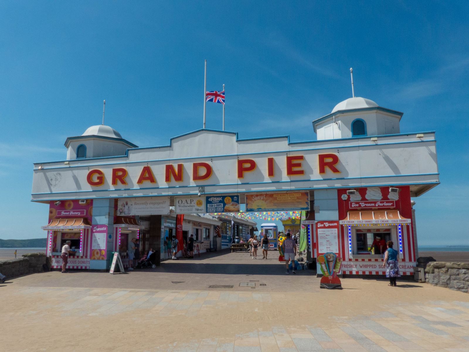 Entrance to a pier on a sunny day