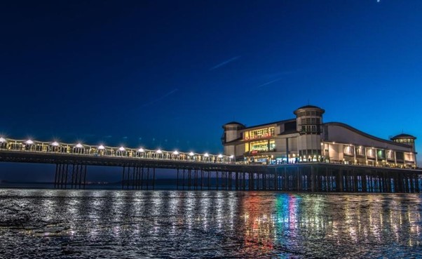 Weston-super-Mare's Grand Pier lit up at night